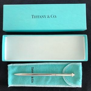Tiffany sterling silver ballpoint pen, with pouch and box. Pen works.